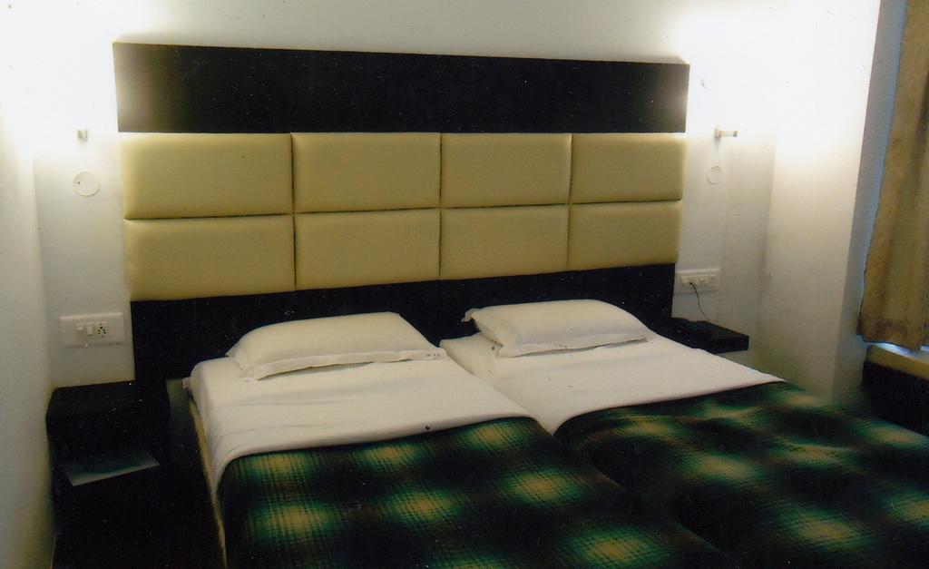 Hotel New Rajdarshan マディケーリ 部屋 写真
